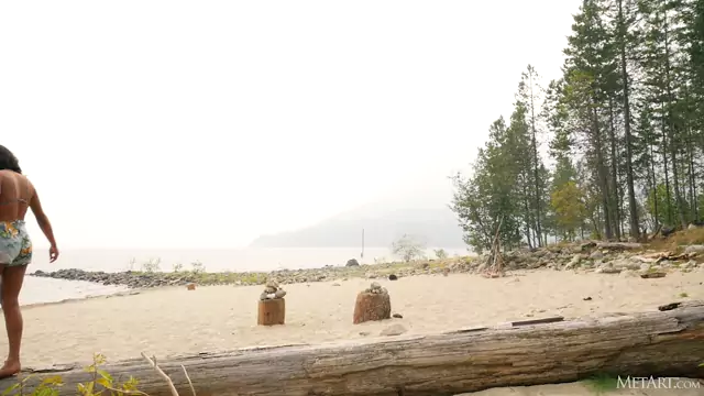 Angel Constance caresses her round Tits on a Beach