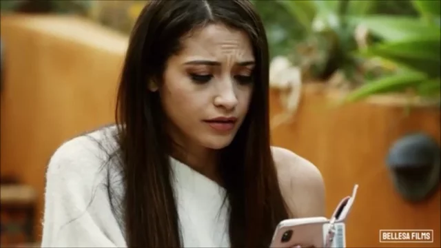 Avi Love has fun with Shyla Jennings on a couch
