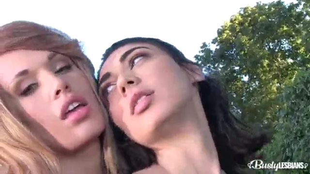 Luna Amor and Lily Madison rub oil all over each others big racks